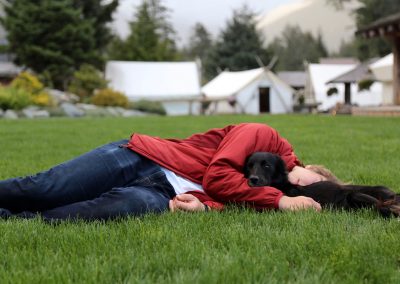 CWR Guest Sleeping on Grass with Mickey